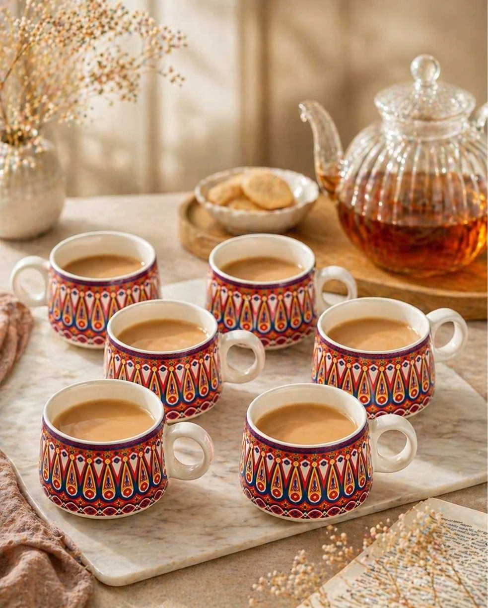 Ceramic tea cups set of 6 with traditional pattern, styled with teapot and snacks